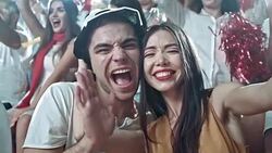Couple in love doing selfies on stadium Stock Footage