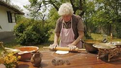 Cooking With Grandma-Old Farmer Lady Making a Loaf of Bread Stock Footage