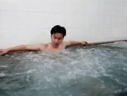 WS A man sits in a traditional Japanese public bath house or sento / Tokyo, Japan Stock Footage