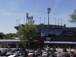 Arthur Ashe Stadium and the grounds of the USTA Center Stock Footage
