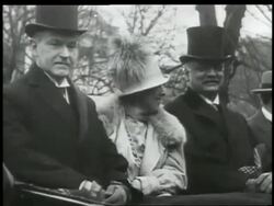 B/W 1927 Grace + President Calvin Coolidge sit next to man in car Stock Footage