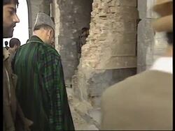 Former king at his Father's tomb News Clip