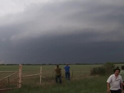 Lightning under clouds, people watching forked lightning, WA, USA Stock Footage