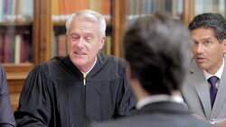 Judge and lawyers talking in meeting Stock Footage