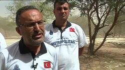Turkish volunteers distribute food and clothing to drought refugees News Clip