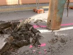 MS Shot of workmen Engraving on street for works at sewage pipe / Saarburg, Rhineland Palatinate, Germany Stock Footage
