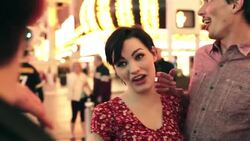 Friends talk and laugh outside casino in downtown Las Vegas Stock Footage