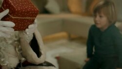 Santa Clause brings presents to kids Stock Footage