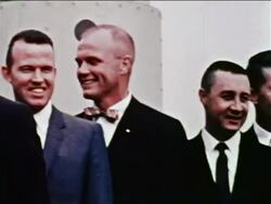 1959 PAN PORTRAIT original 7 astronauts wearing suits posing for group photo / newsreel Stock Footage
