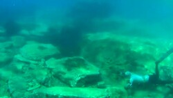 Man diving Underwater Stock Footage