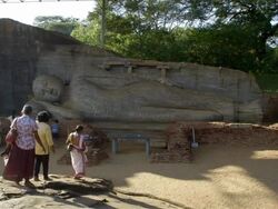 GAL VIHARA RECLINING BUDDHA CARVING Stock Footage