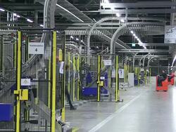 MS Shot of worker working at newspaper printing office / Russelheim, Hesse, Germany Stock Footage