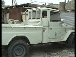 WRAP Smoke from car bomb, US troops, UK troops in Basra, dead from raids News Clip