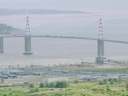 WS AERIAL ZO View of St Nazaire Bridge and airport / Pais de la Loire, France Stock Footage