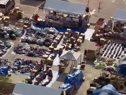 September 13, 2005 aerial relief workers sorting aid at relief camp / Slidell, Louisiana Stock Footage