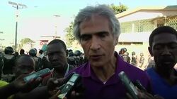 Protest against ruling that could strip citizenship from people of Haitian descent living in Dom Rep Instructional Video