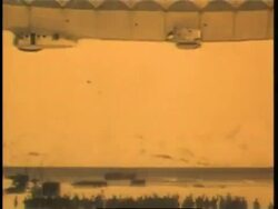 Explorer Roald Amundsen waves from a dirigible as it takes off to explore the North Pole. News Clip