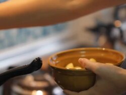 Women put potato to curry chicken spicy soup Stock Footage