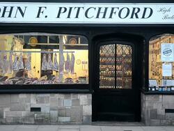 UK butcher's shop John F Pritchard's in the Minster Town of Southwell, Nottinghamshire on March 5, 2013. Stock Footage