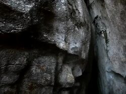W/S karstic rocks, crevice (dolly track) Stock Footage