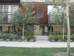 MS Young man dressed up in black suit and coming from house / Minneapolis, Minnesota, United States Stock Footage