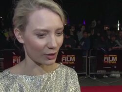 INTERVIEW - Mia Wasikowska on the universal appeal of the story, on 'Madame Bovary', working with Rhys Ifans, on London at 'Madame Bovary' Red Carpet Stock Footage