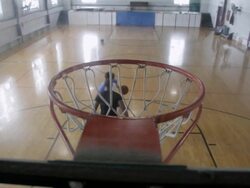 WS  Two young men playing basketball against each-other inside  gymnasium / Minneapolis, Minnesota, United States  Stock Footage