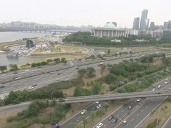 WS T/L View of National Assembly Building and Ollimpikdaero Road / Seoul, South Korea Stock Footage