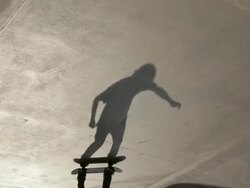 WS Shadow of Young man skateboarding and kick flipping in skatepark/Singapore Stock Footage