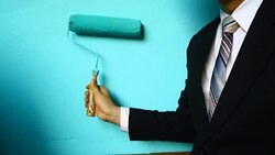 businessman hand hold Paint Roller Stock Footage