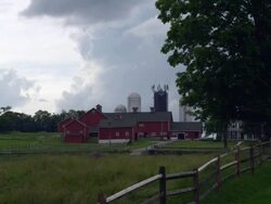 Ct Dairy Farm with storm clouds Stock Footage