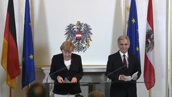 Merkel visits, says ECB committed to currency stability Instructional Video