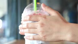 HD: hand hold ice tea cup. Stock Footage