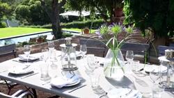 Table with luxury place settings in backyard Stock Footage