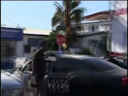 Shootout between police and gunmen leaves one dead, four wounded News Clip