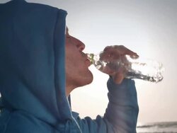 Jogging at the beach Stock Footage