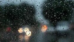 Traffic at night during rainy season Stock Footage