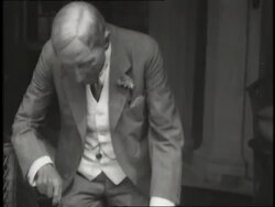 Elderly John D. Rockefeller cuts a piece of birthday cake. News Clip