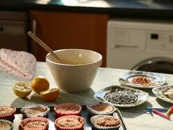 MS Shot of woman checking glazing mixture for cupcake / London, Greater London, United Kingdom Stock Footage