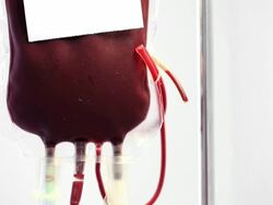 HD Tilt down crane shot: Blood transfusion Stock Footage