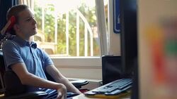 Cerebral palsy patient using computer Stock Footage