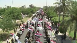 CLEAN : Fighters in military uniforms march in Baghdad for Jerusalem Day News Clip