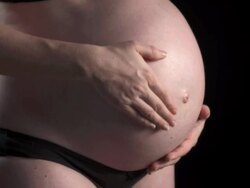 HD: Caressing A Beautiful Pregnant Belly Stock Footage