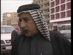 Interview with tribunal judge plus vox pops on Saddam's fate News Clip