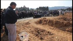 Mass funeral for victims of tsunami Instructional Video