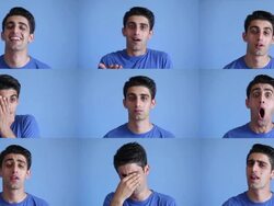 Facial expressions montage of young man on blue background Stock Footage