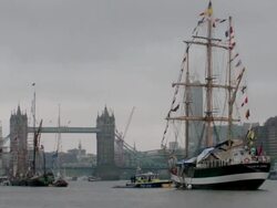 WS T/L Jubilee Regatta sailing ships Moored at tower bridge on Thames River / London, United Kingdom Stock Footage