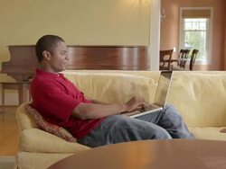 MS PAN Man working on laptop / Portland, Oregon, United States  Stock Footage