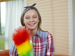 HD DOLLY: Portrait Of A Teenage Girl With Duster Stock Footage