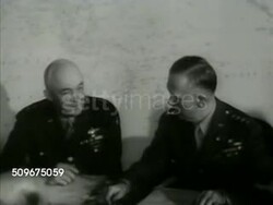 1942: U.S. JOINT CHIEF OF STAFF:  INT VS US General talking at table, Generals Henry H. 'Hap' Arnold (1886-1950) & George Marshall Jr. talking, Admiral John S. McCain Sr. (1884-1945) at table. MS Generals looking at globe. CU Pointing to Africa. WWII Instructional Video